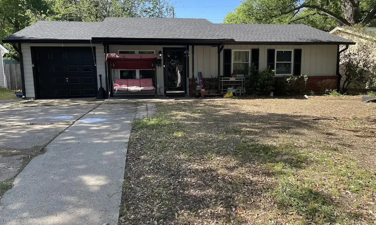 Asphalt Shingle Roof Repair crew at work on a residential roof in Fultondale